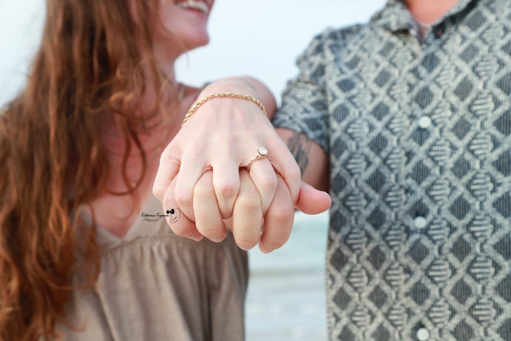 Engagement and proposal portrait photography sessions at Florida beaches and parks.