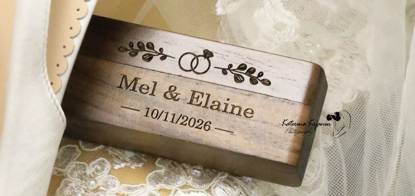 Close-up wedding photography of a wedding dress, shoes and names tag, capturing the elegant details of the wedding day.